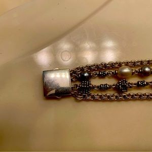 Michael Dawkins silver bracelet four strands